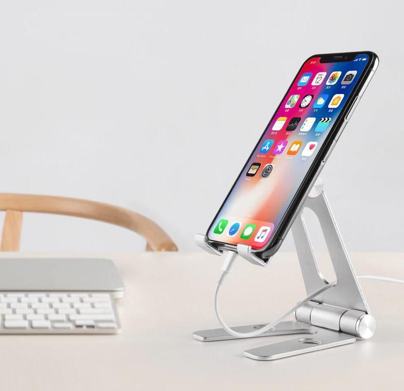Folding and rotating support for phone or tablet